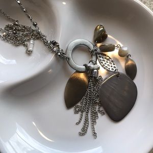 Long silver tone pendant necklace